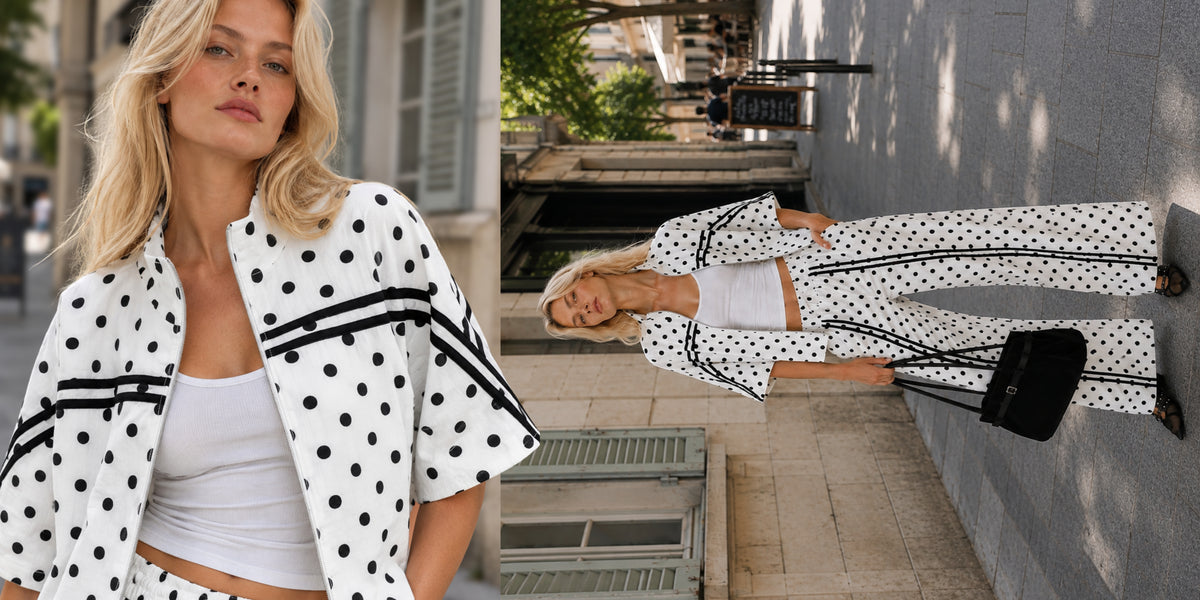 Weißes Polka-Dot Matching Set für Damen mit kurzer Jacke und weiter Hose – modischer Sommerlook in der Stadt.