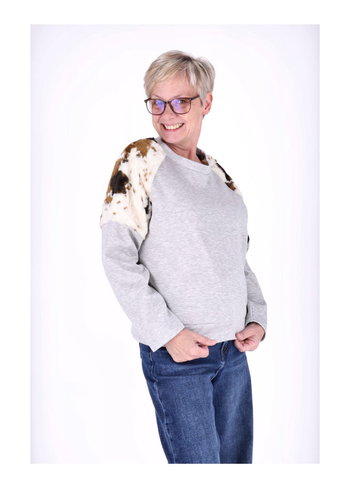 Splash of Color Sweatpullover Kuhfelleinsatz