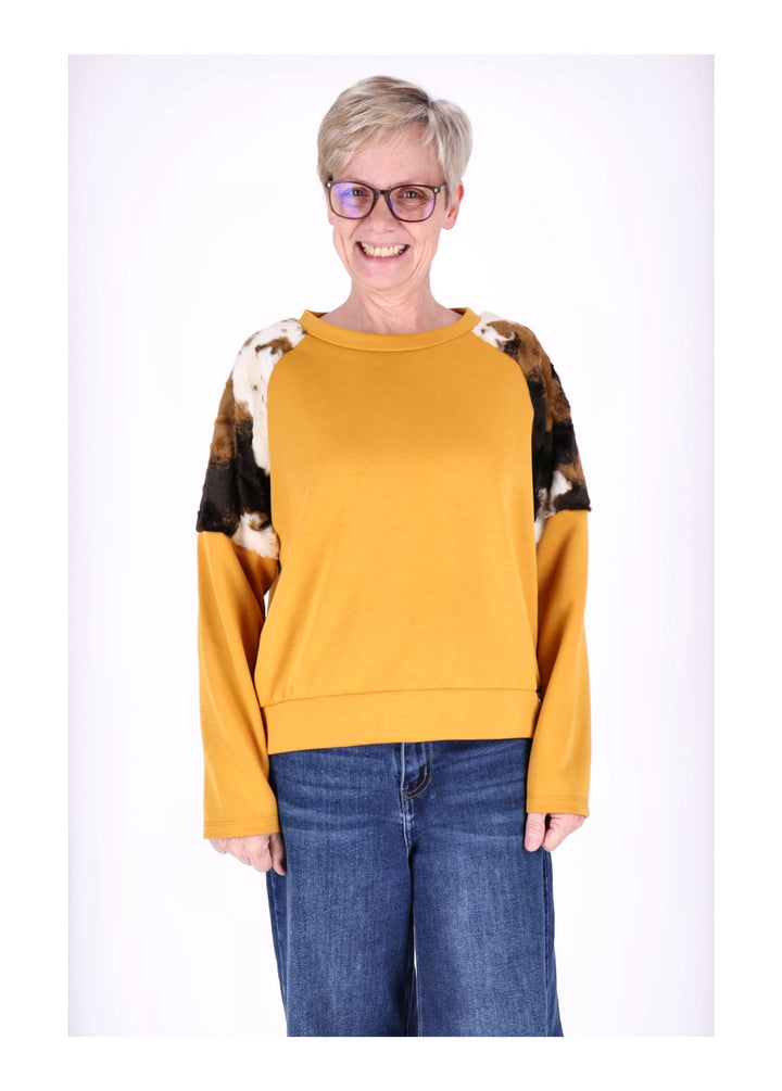 Splash of Color Sweatpullover Kuhfelleinsatz