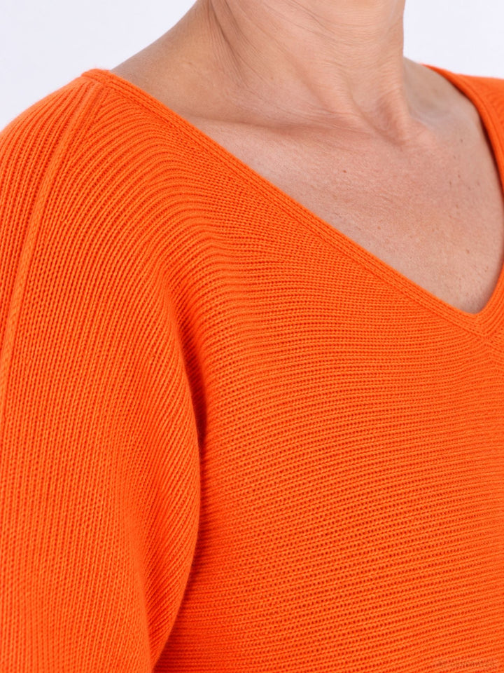 Orange Schwarzer Strickpullover Damen V-Ausschnitt abgerundeter Bund