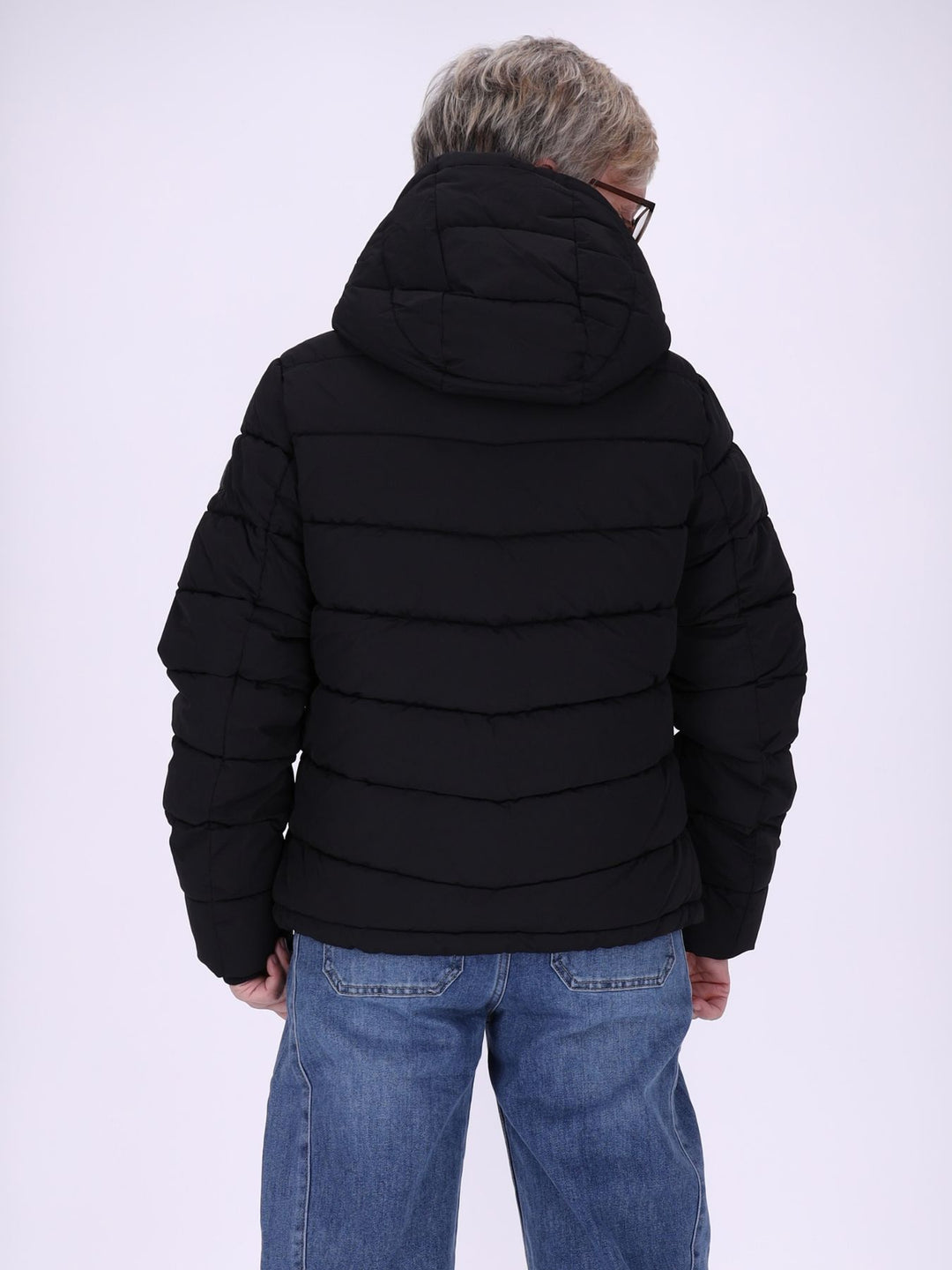 Schwarze Damen Steppjacke mit Fake-Fur-Futter & recyceltem Material – kuschelig, modern & vielseitig