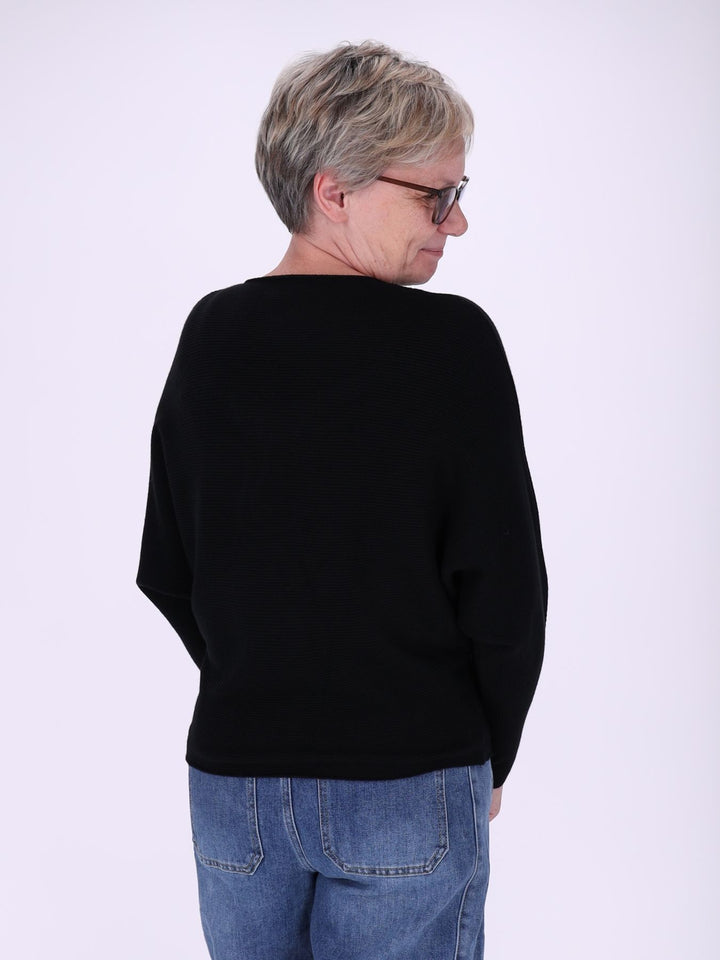 Schwarzer Damen Strickpullover mit Fledermausärmeln – elegant, weich & modern